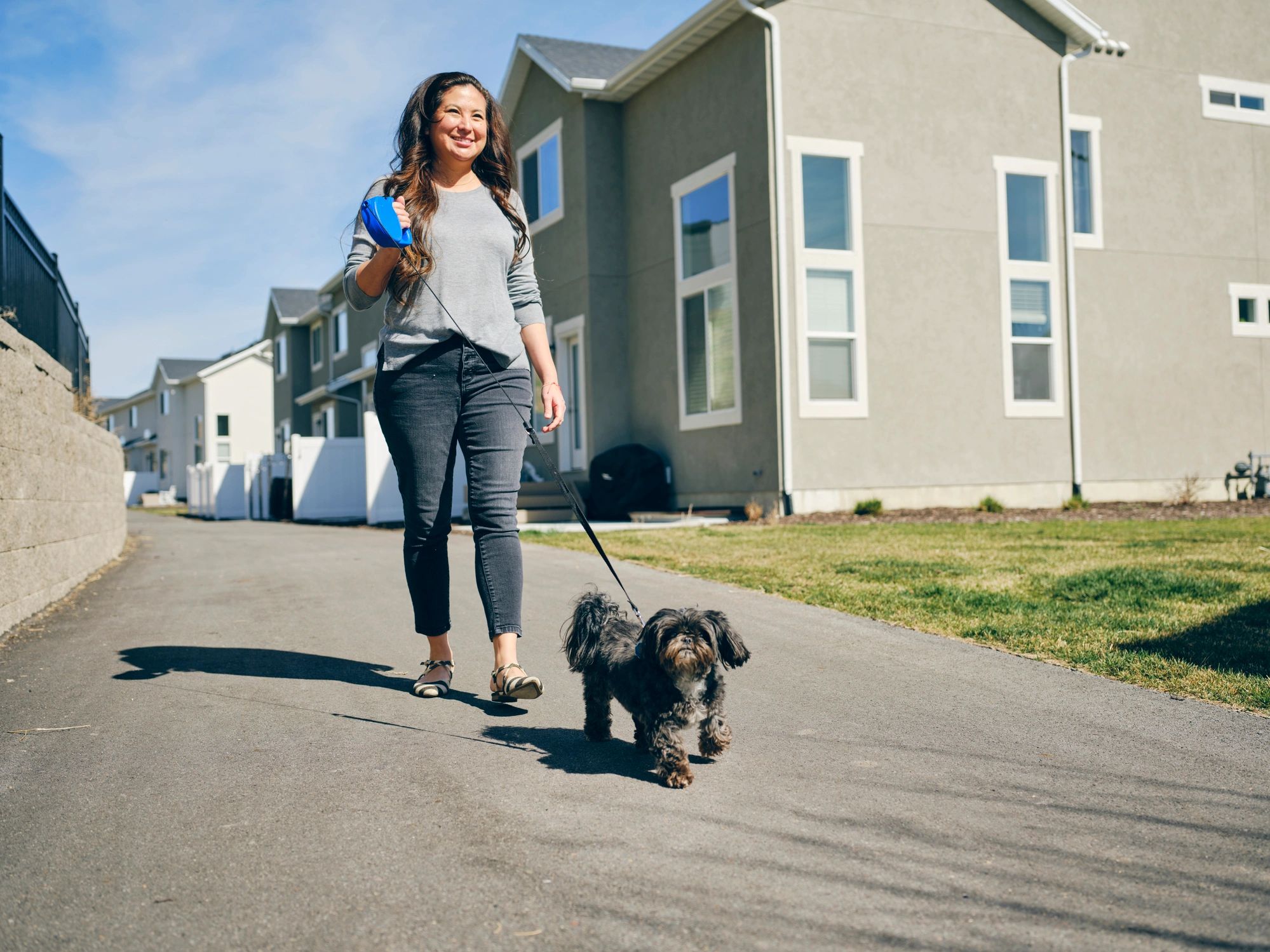 Woman at Home With Her Pet Dog